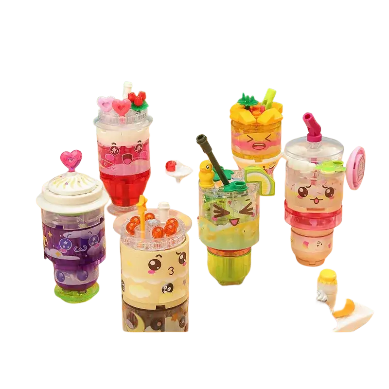 Cute colorful plastic toy drink cups with cartoon faces and playful toppings in fast food micro building block set