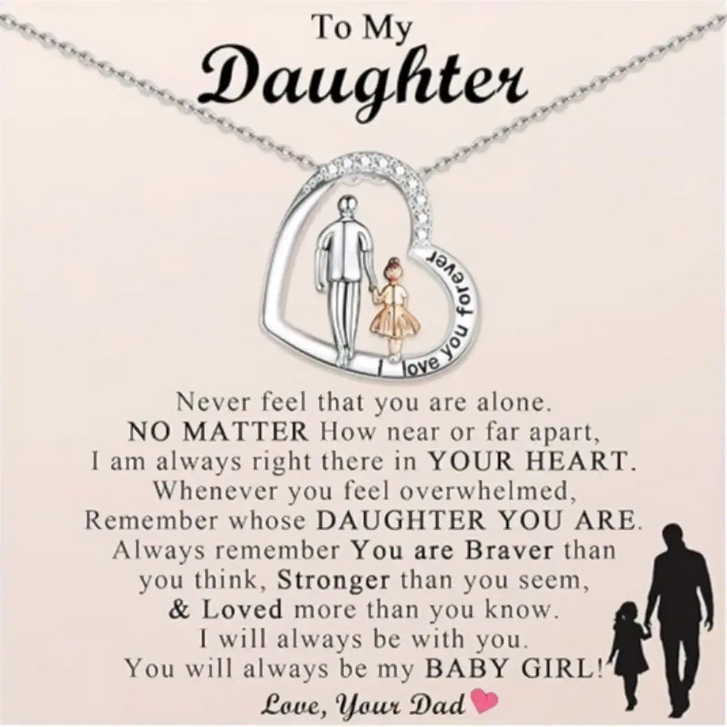 Silver heart-shaped pendant necklace with father and daughter silhouette and clear border stones memorial jewelry