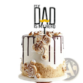 White acrylic father’s day cake topper with black my dad is my hero text and yellow mustache on decorated cake
