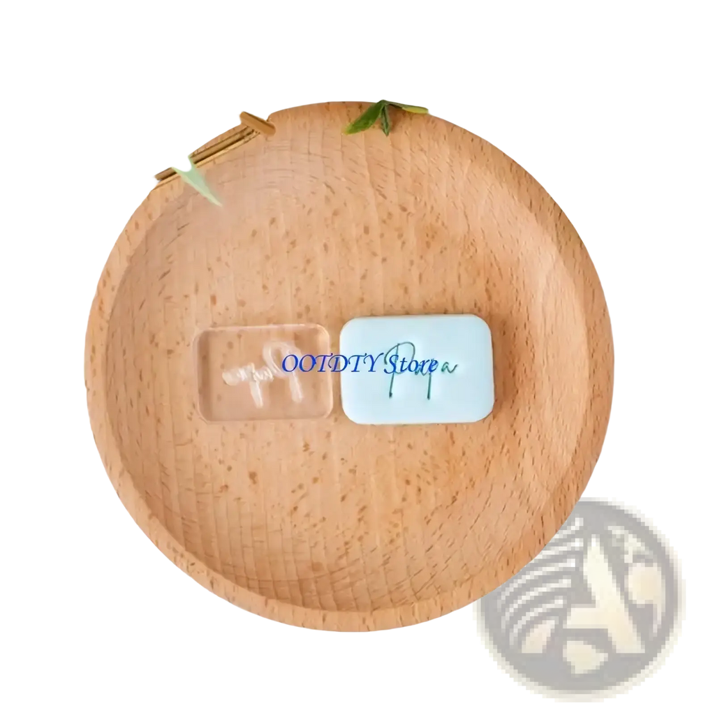 Light blue rectangular soap with papa engraved in cursive from father’s day cookie cutter and fondant stamp set