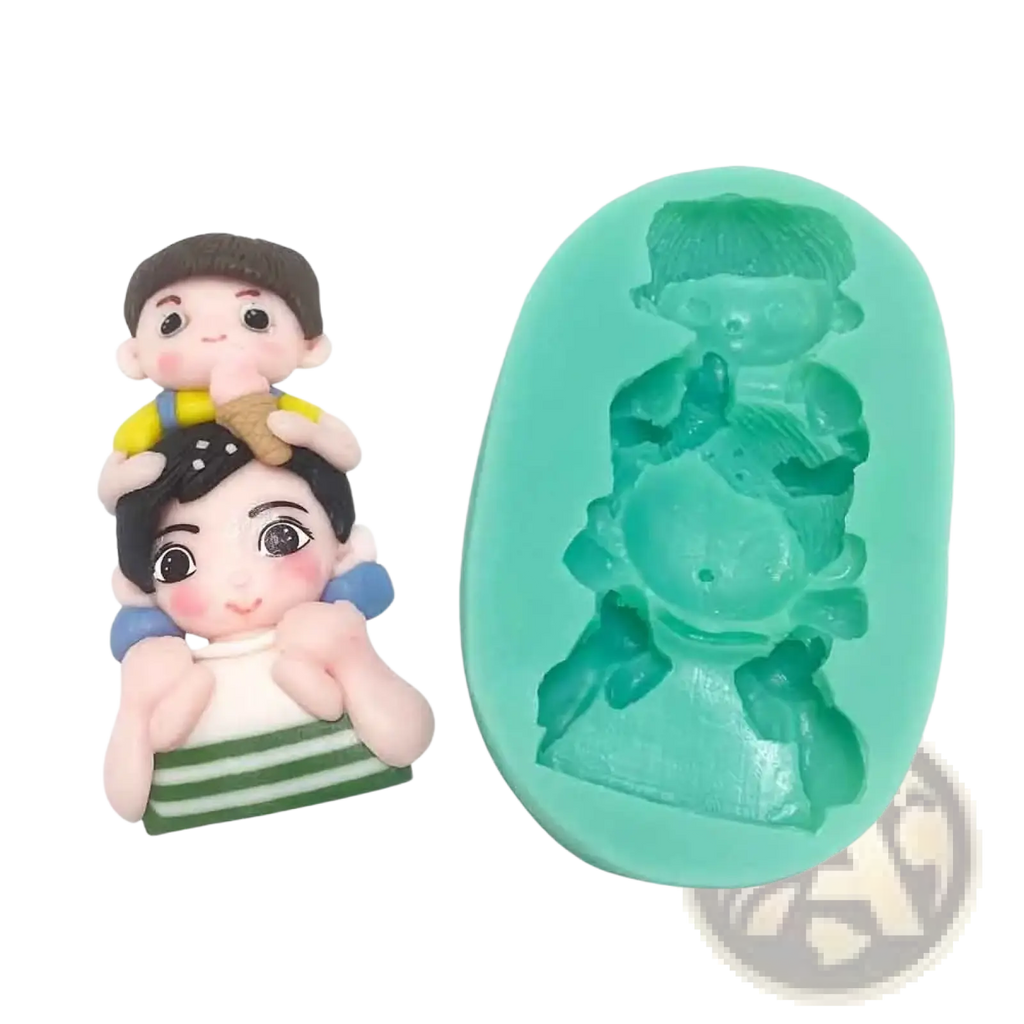 Cute turquoise silicone mold featuring detailed cartoon boy and girl design for superhero family cake decor
