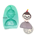 Teal silicone mold shaped like a cartoon man with glasses and party hat for Father’s Day superhero family cake decor