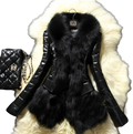 Black quilted faux fur vest with glossy patent leather finish and plush black fox fur collar for stylish warmth