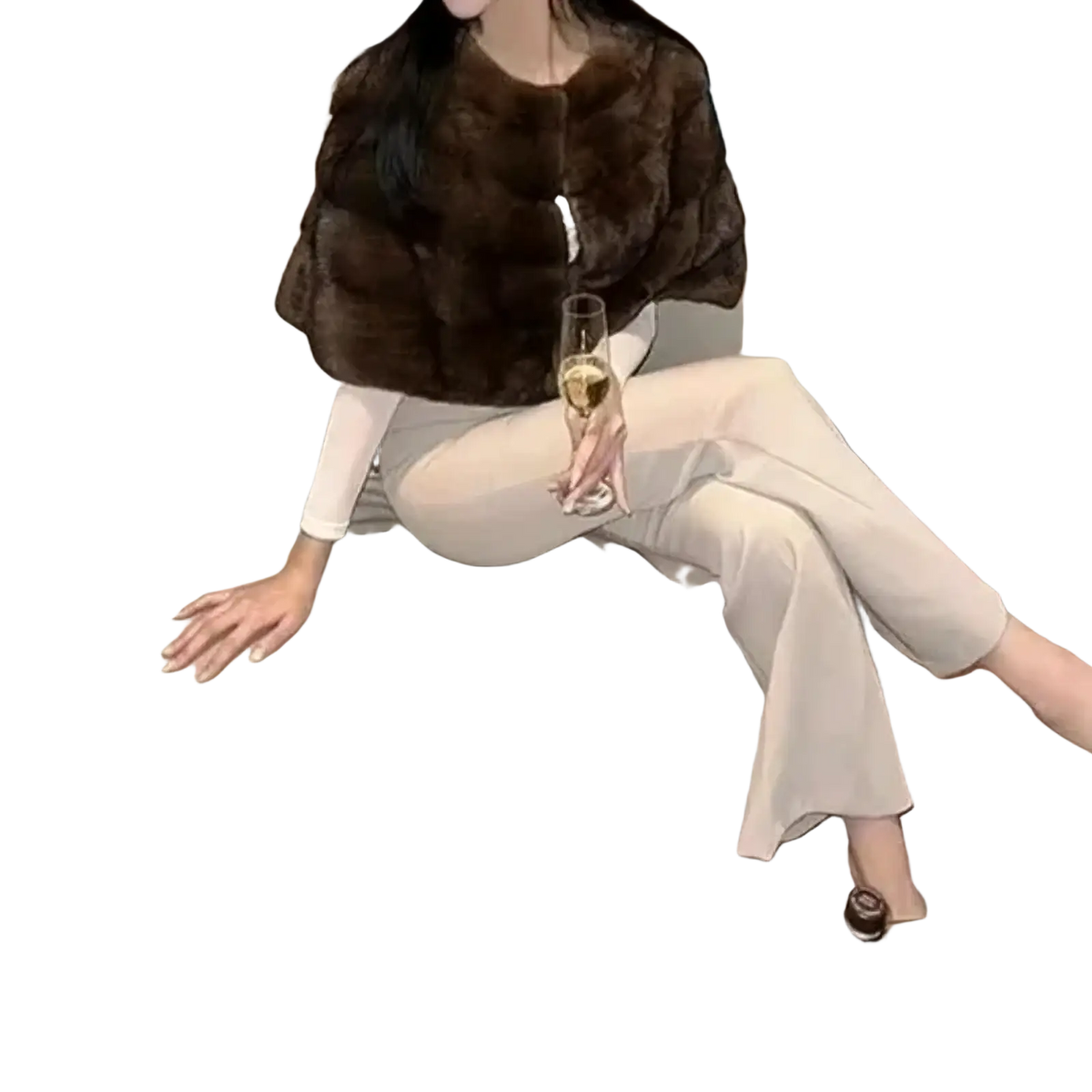 Plush dark brown faux fur cropped winter jacket for women with soft luxurious texture and subtle sheen shown from back
