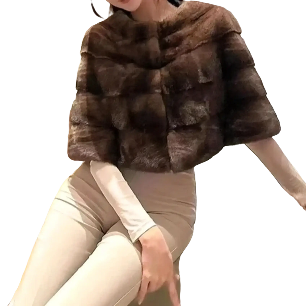 A rich dark brown faux fur cropped winter jacket for women with plush layered texture and soft luxurious appearance