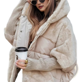 Beige faux fur hooded puffer coat with plush lining and ribbed knit cuffs for warmth and style