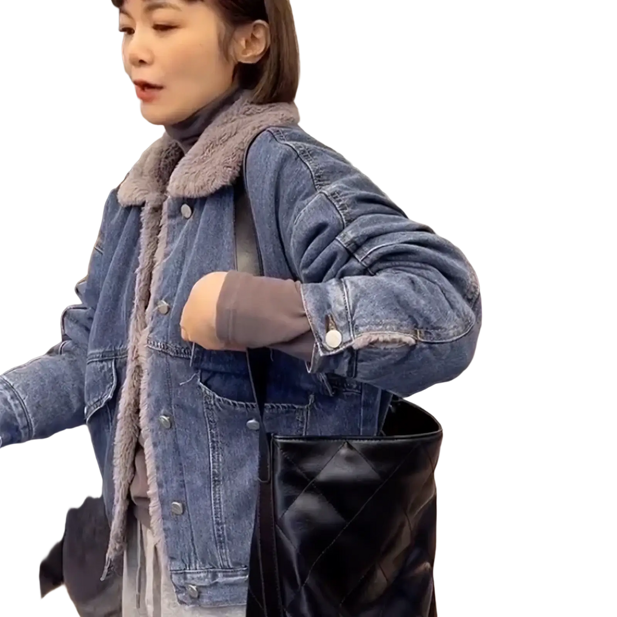 Black quilted leather tote bag paired with faux fur lined denim jacket for women winter fashion use