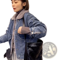 Black quilted leather tote bag paired with faux fur lined denim jacket for women winter fashion use
