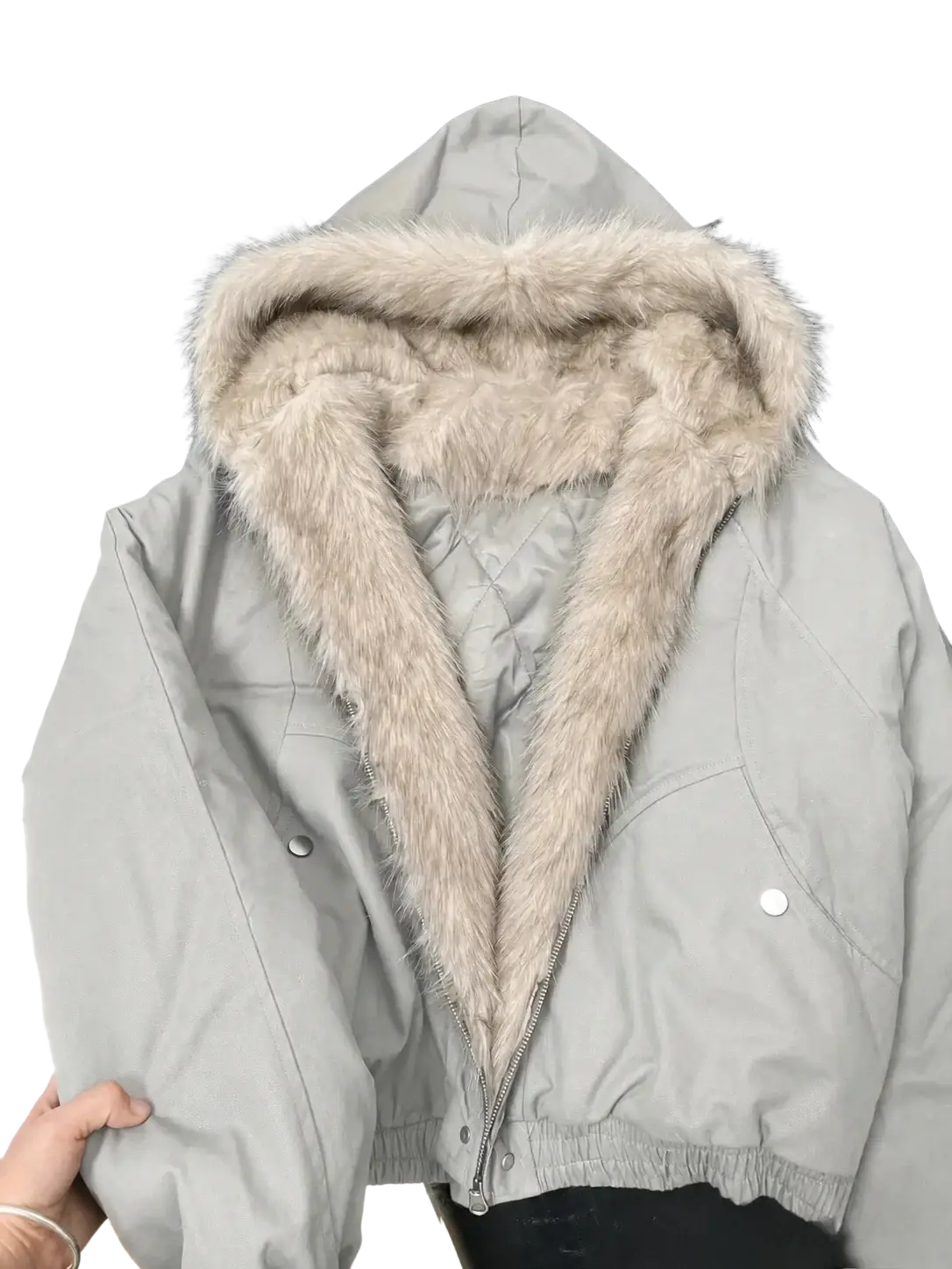 A light gray faux fur puffer jacket for women with plush beige faux fur-lined hood and quilted panels for winter outerwear
