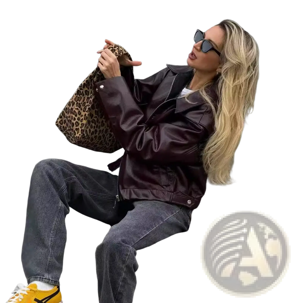 Leopard print faux leather tote bag with a structured slouchy silhouette and visible stitching details