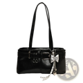 Black faux leather shoulder bag with silver buckle and bow charm in patent leather finish for elegant use