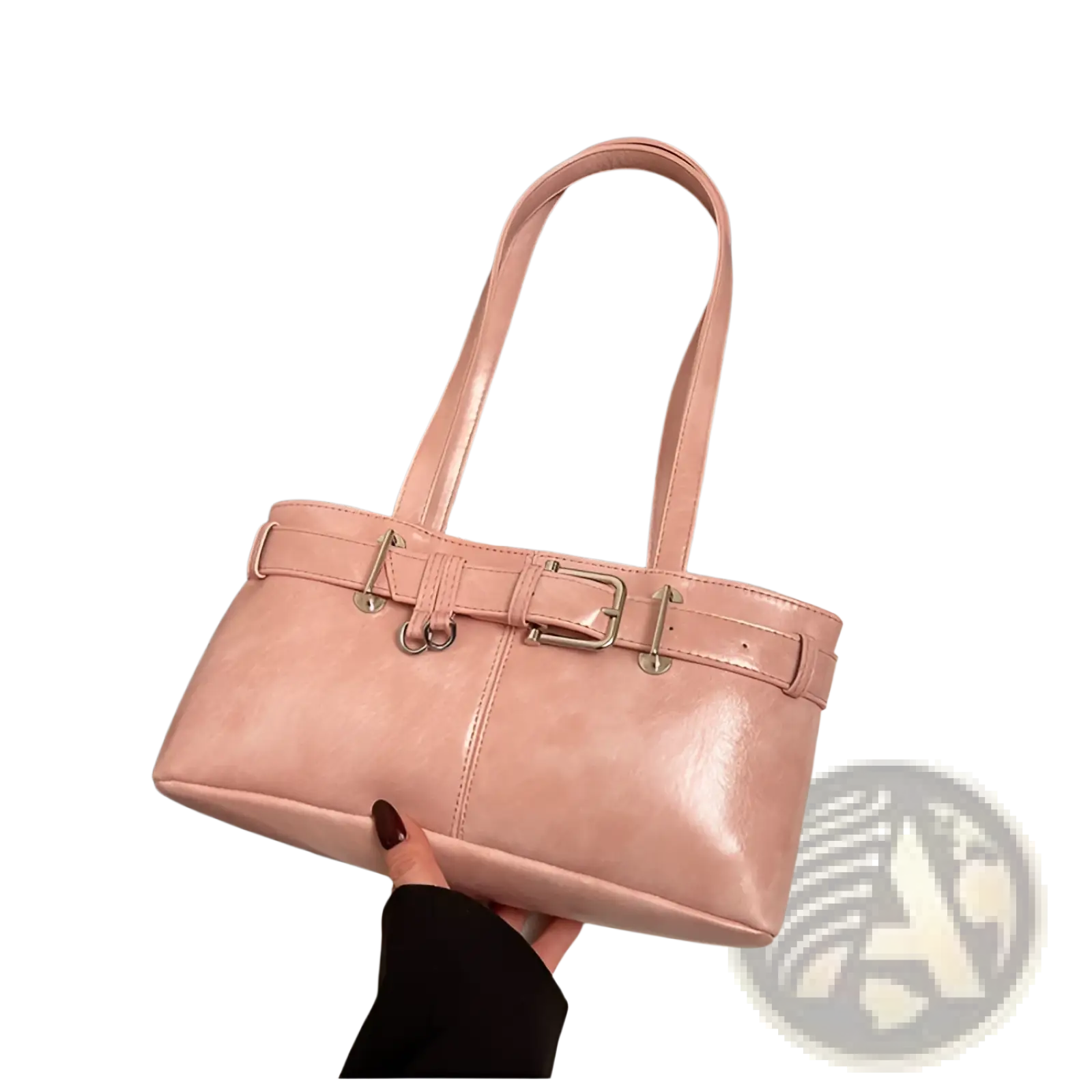 A soft pink faux leather buckle shoulder bag with structured rectangular shape and silver-toned buckle straps