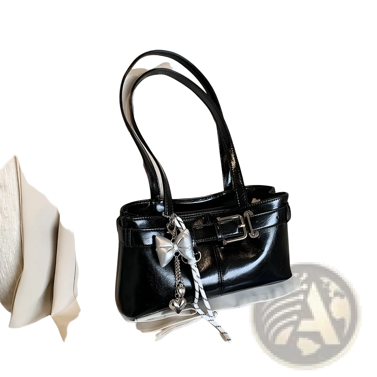 Black faux leather shoulder bag with silver buckle and bow charm featuring a glossy patent finish