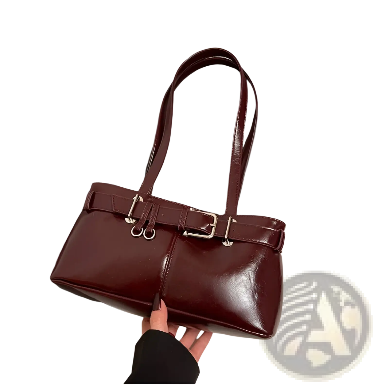 Glossy burgundy faux leather buckle shoulder bag with silver-toned straps and structured rectangular design with bow charm