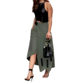 Black faux leather bucket bag with chain-link handle and metallic hardware closure paired with crop top and skirt set