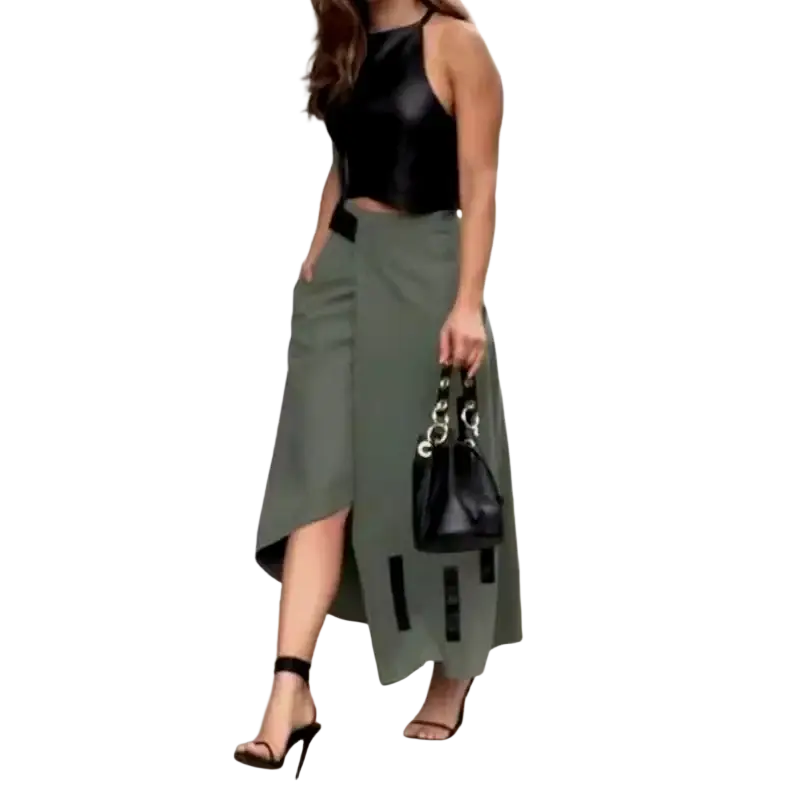 Black faux leather bucket bag with chain-link handle and metallic hardware closure paired with crop top and skirt set