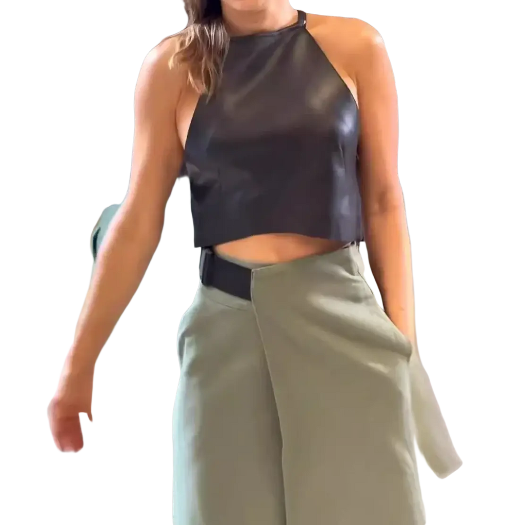 Black faux leather halter neck crop top with shiny finish and adjustable tie closure for a two piece set