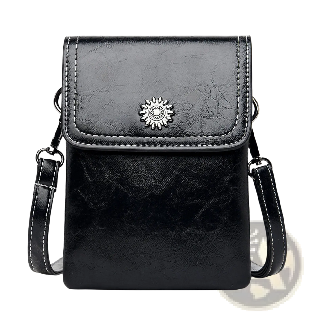 Black faux leather crossbody phone bag with silver sunburst clasp and white stitching for hands-free use