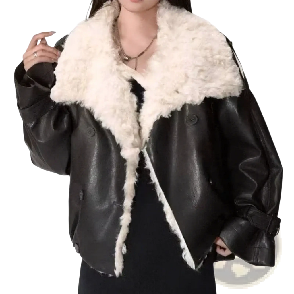 Black faux leather bomber jacket with plush white shearling collar and lining in a faux leather fur lined coat style