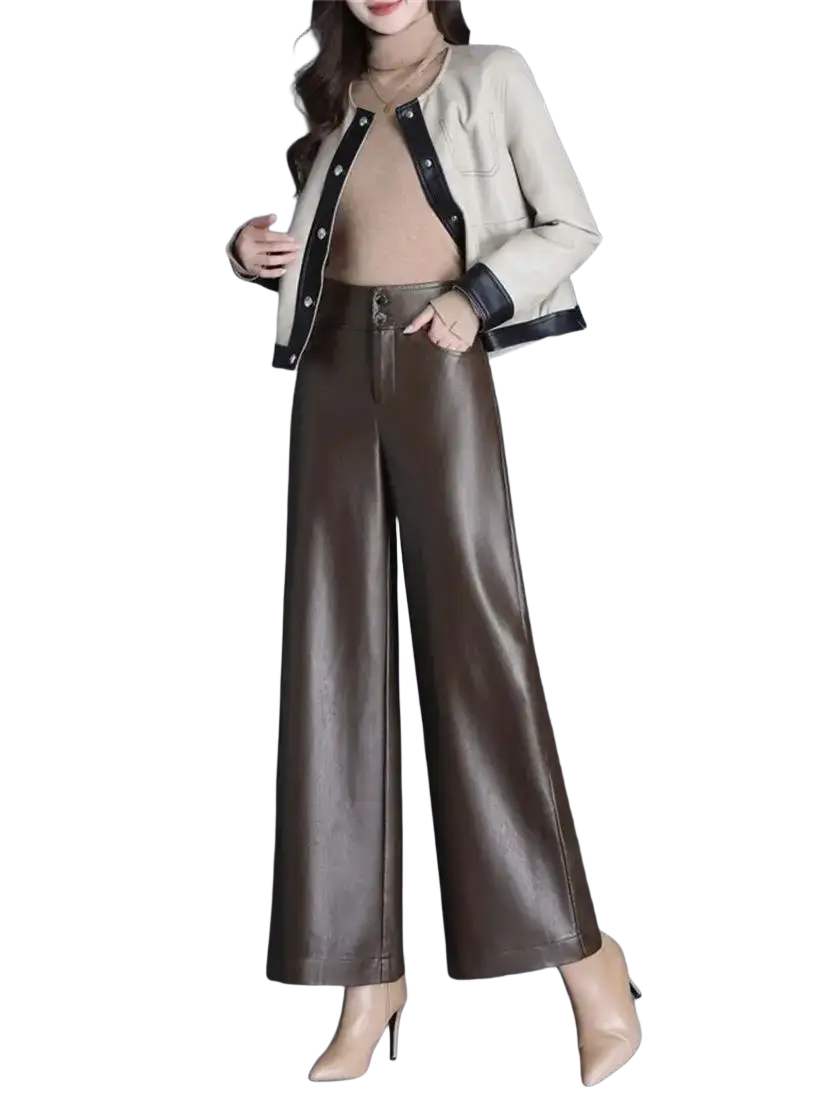 A sleek high waist brown faux leather wide leg pant with glossy finish and subtle creases for stylish wear