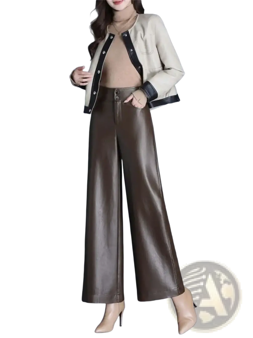 A sleek high waist brown faux leather wide leg pant with glossy finish and subtle creases for stylish wear