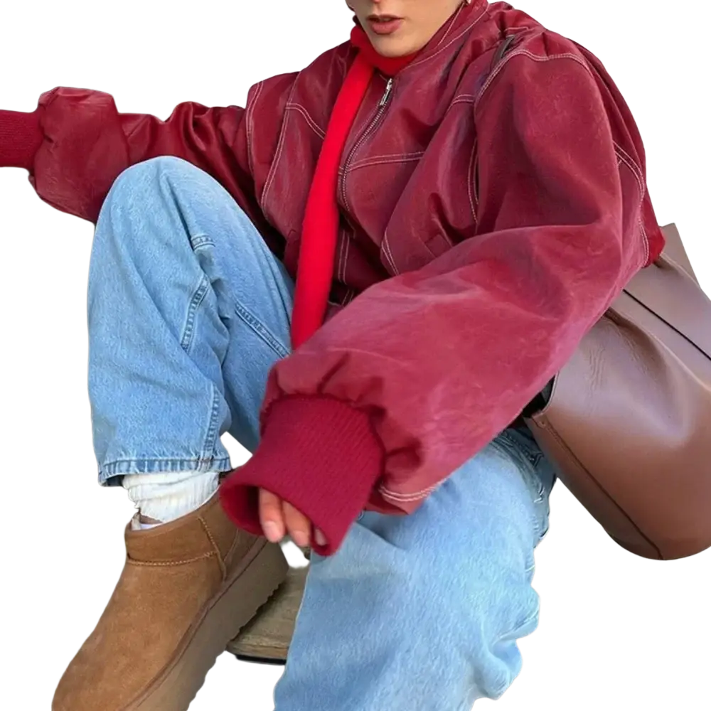 Red faux leather streetwear jacket for women with puffed sleeves and contrasting white stitching