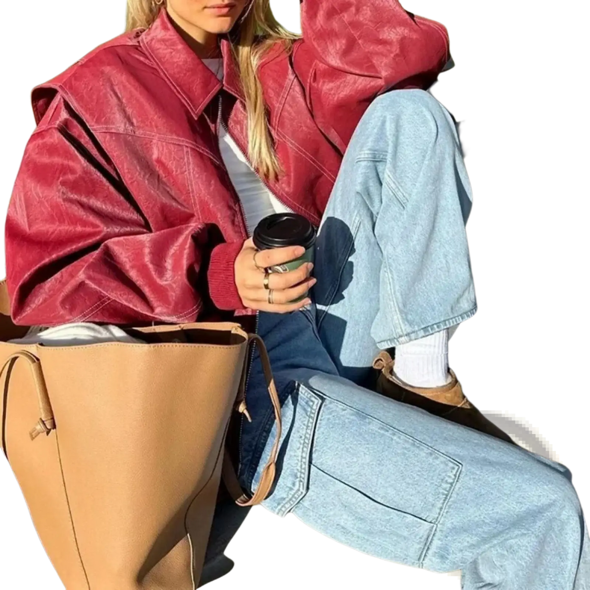 A tan leather tote bag with a structured shape and top handle complementing faux leather streetwear jacket women
