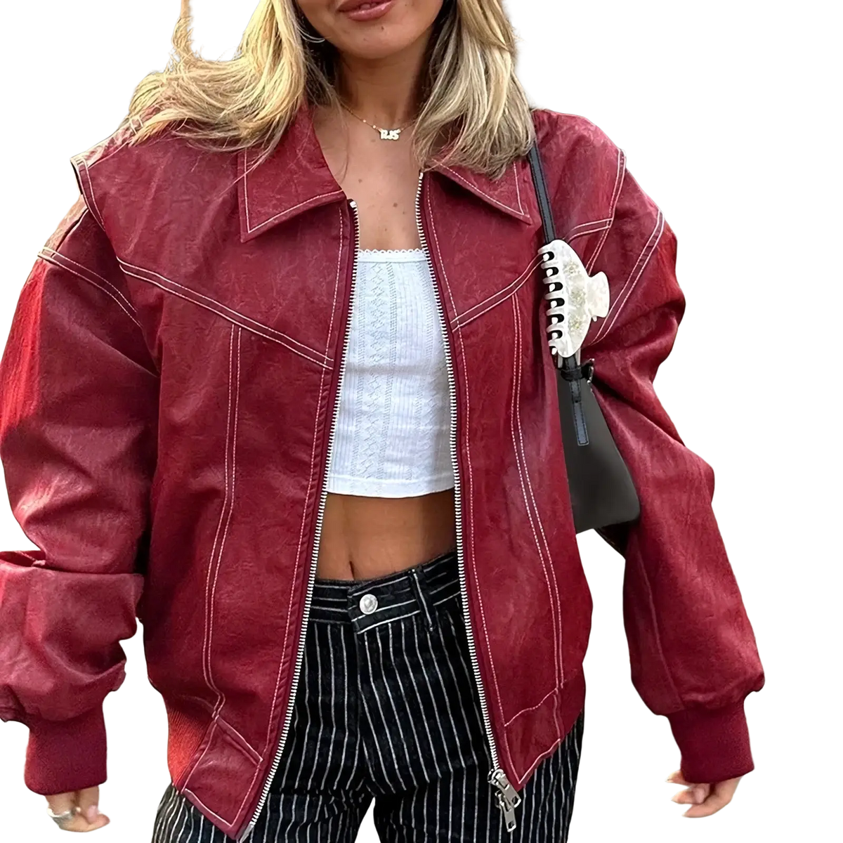 A textured deep red faux leather streetwear jacket for women with white stitching and a zipper front closure