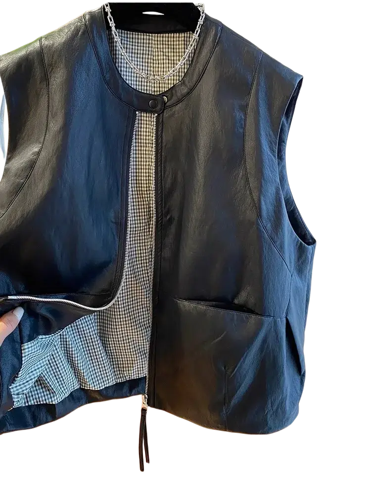 Black faux leather vest for women with checkered interior lining and front zipper closure casual sleeveless top
