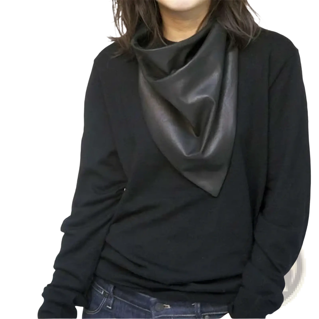Black faux leather winter scarf with cowl neck worn over a black long-sleeved top for head cover use