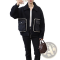 Black wool-blend faux shearling jacket with denim patch pockets white stitching and silver buttons front view