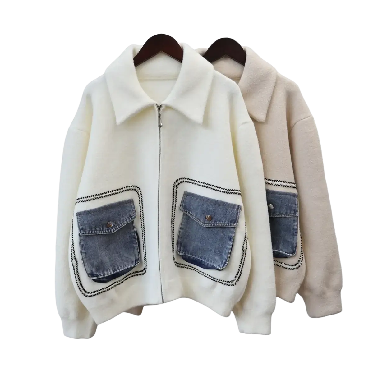 Cream-colored faux shearling jacket with denim patch pockets and black stitched trim for casual wear
