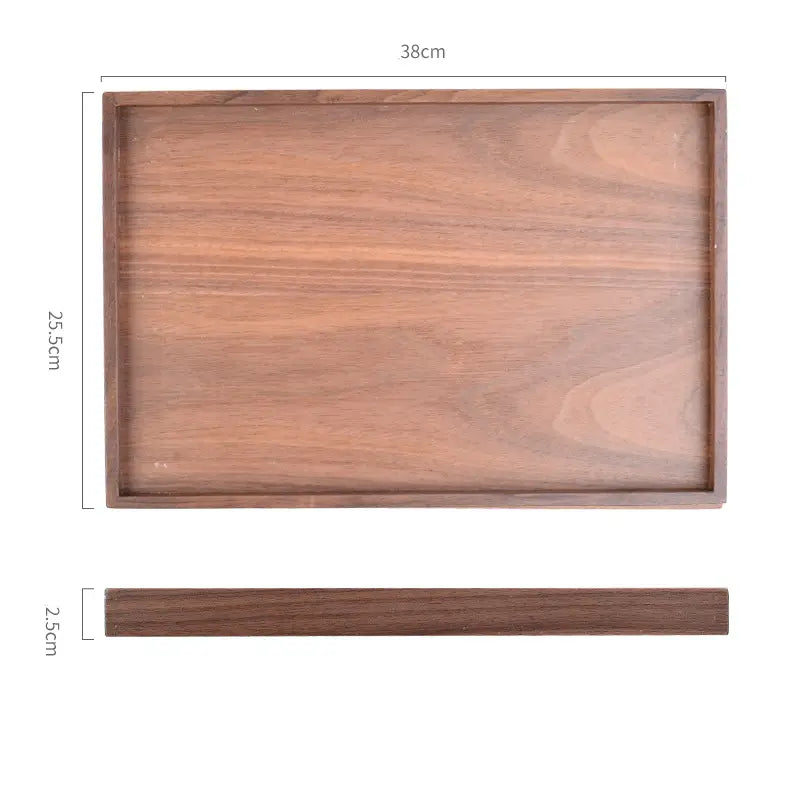 Acacia wood rectangular serving tray with a smooth medium brown finish and natural wood grain pattern hand polished for elegant presentation.