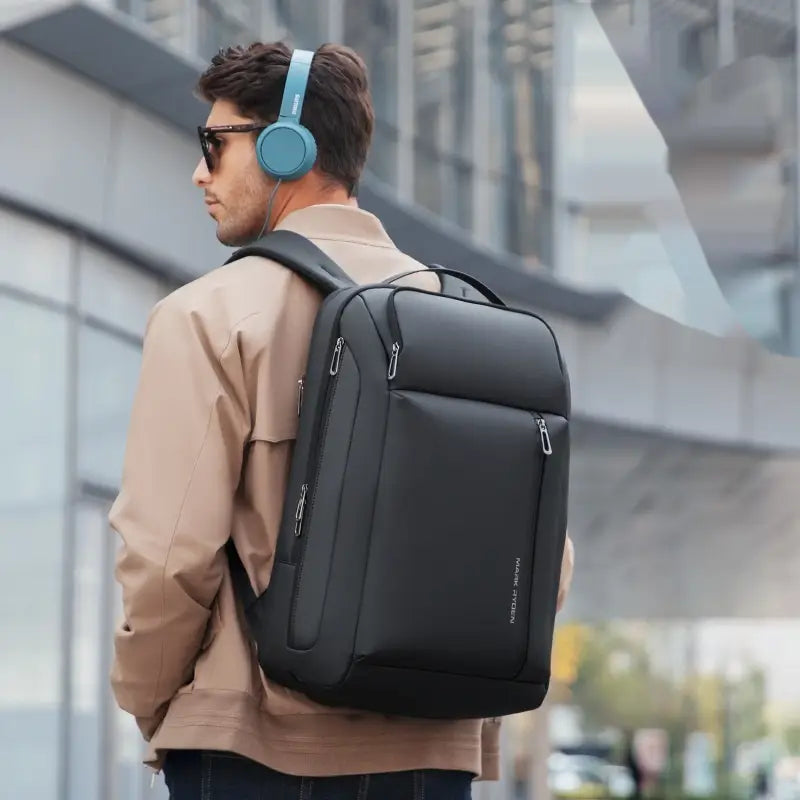 Business-Reiserucksack, eleganter Oxford-Laptop-Rucksack, in Schwarz mit mehreren Reißverschlüssen und modernem Design.