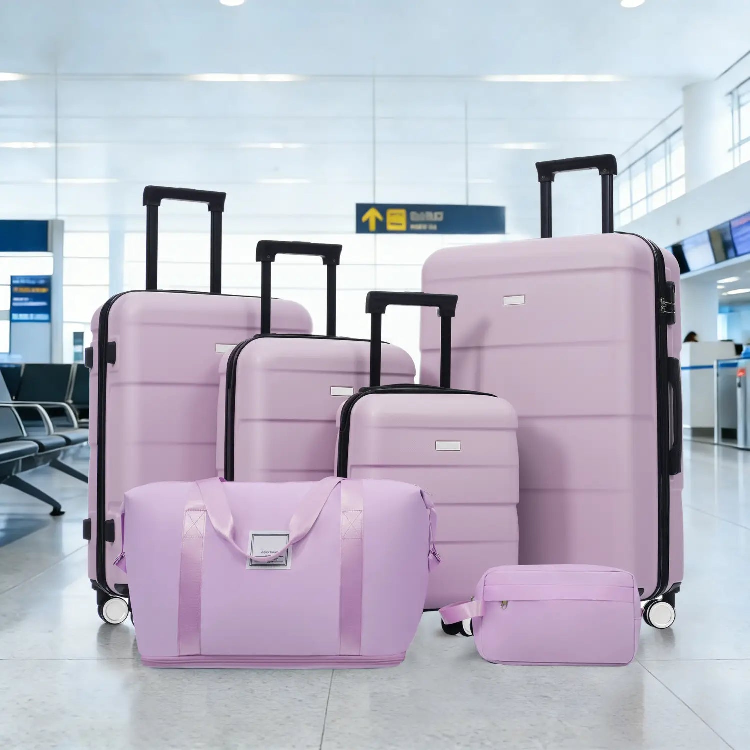Lavender 6 piece hardshell luggage set featuring five pastel pink suitcases and a matching fabric carry-on bag with black trim and spinner wheels.