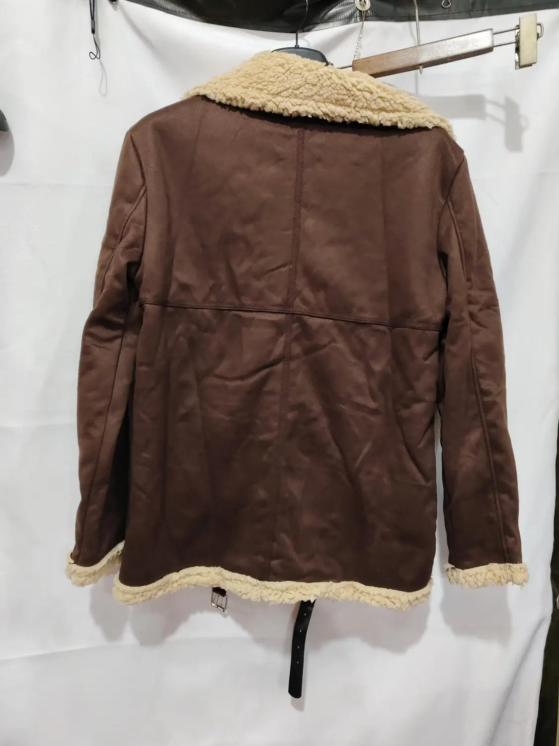 Men shearling bomber jacket in brown with a soft plush beige shearling-lined collar and cuffs.