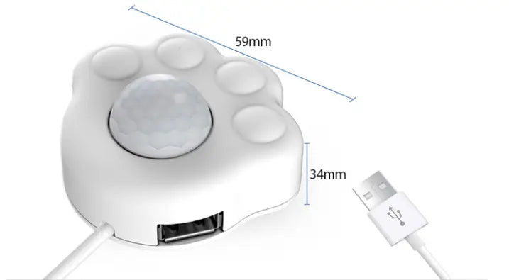 weißer pattformiger USB-Hub mit Infrarotsensor auf der Oberseite und abgerundeten Katzentatzen-Pads, ausgelegt als Zubehör für einen smarten Wasserautomaten für Haustiere