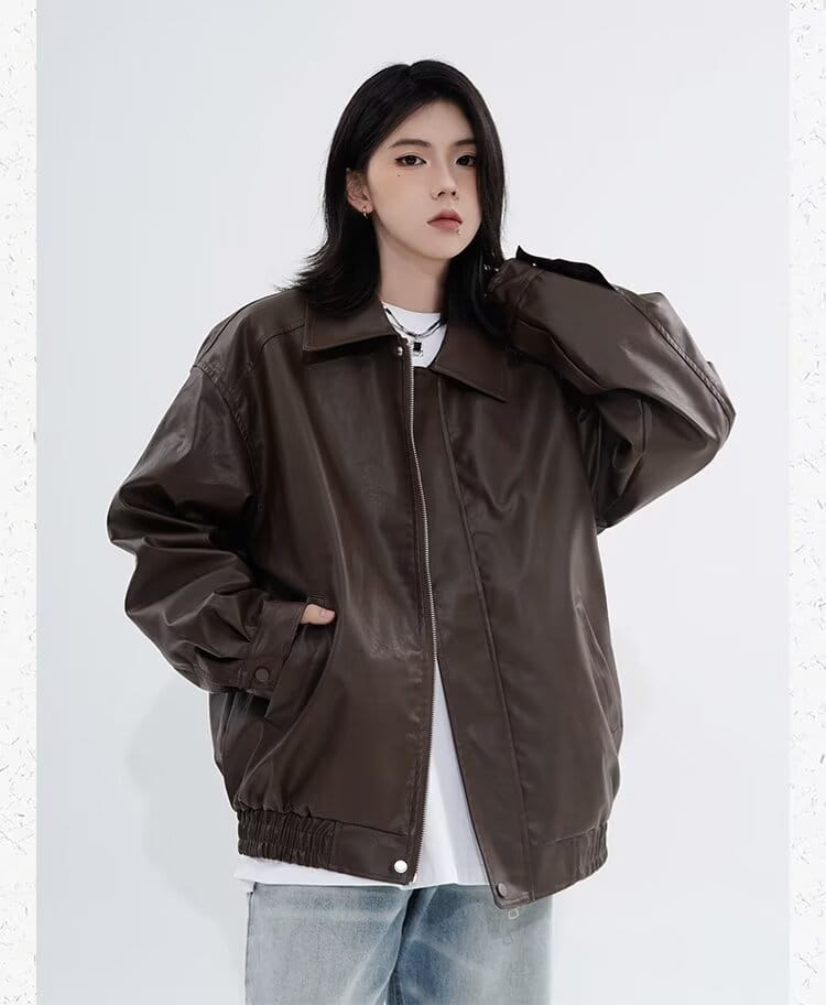 Men’s faux leather bomber jacket in brown with a matte finish and ribbed cuffs featuring a relaxed fit for outerwear.