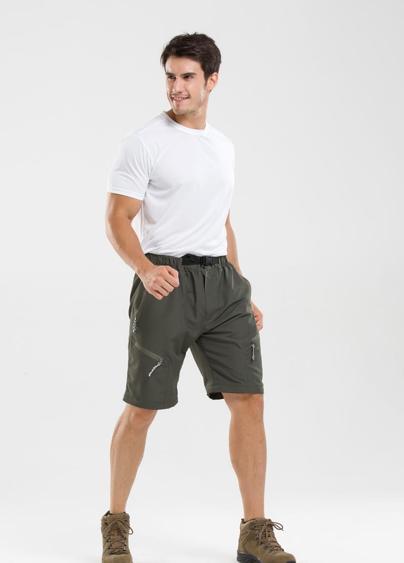 olive green convertible tactical hiking pants in cargo shorts style featuring side pockets and a black elastic waistband for outdoor use