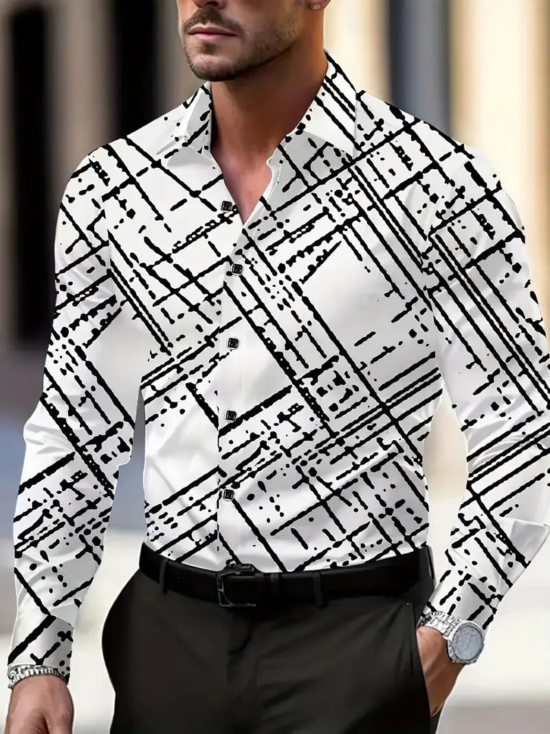 Ein Mann, der ein weißes Hemd mit langen Ärmeln im Freizeitstil trägt, mit kräftigen schwarzen abstrakten geometrischen Linien und Punkten über dem gesamten Stoff.