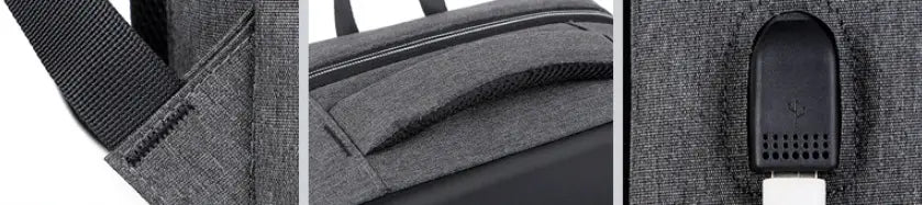 Gray textured fabric business laptop backpack made of oxford cloth with a black zipper and usb charging port on the side.