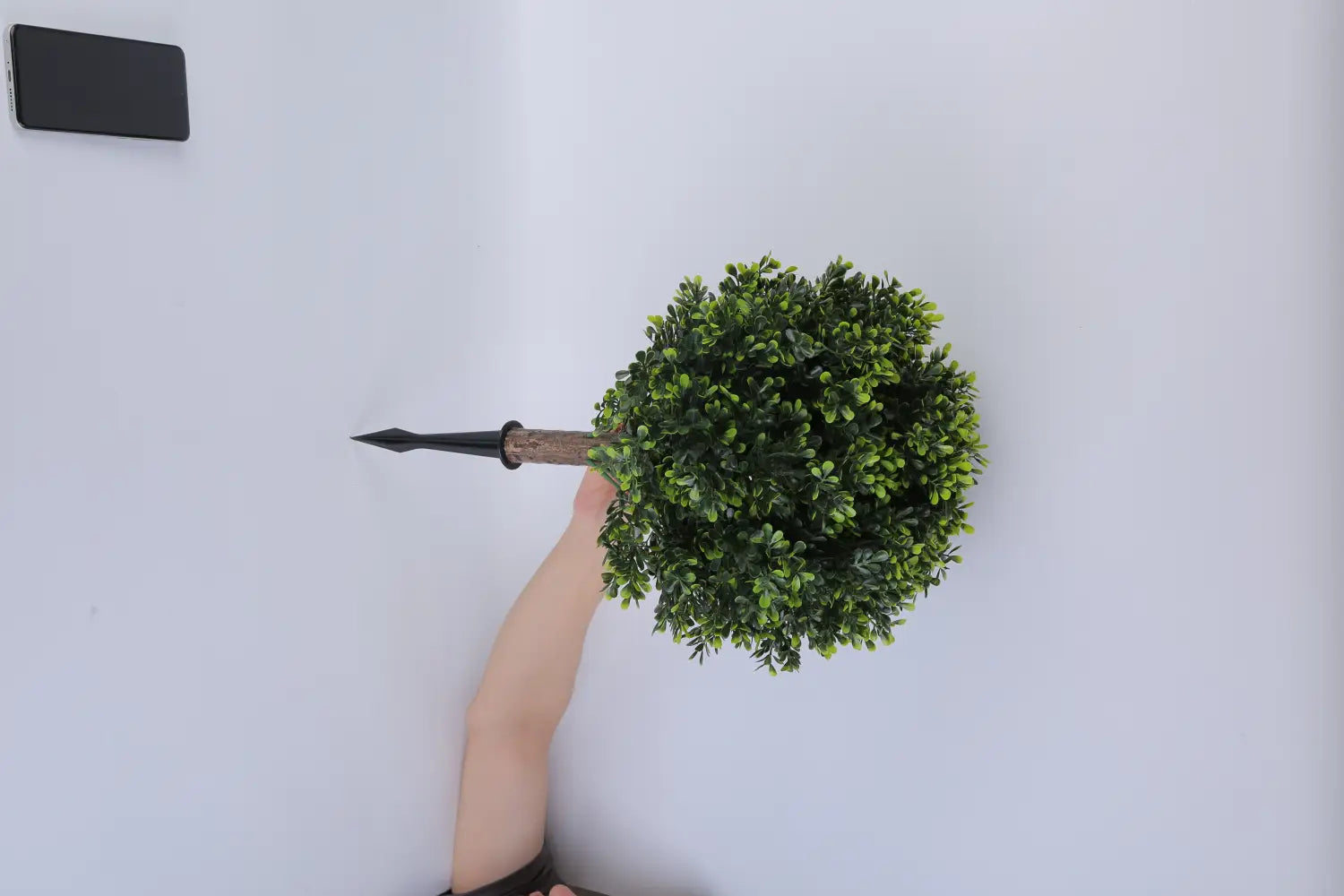 artificial boxwood ball topiary trees with spikes 2 pack featuring a round green artificial topiary bush with dense foliage and a wooden stake base