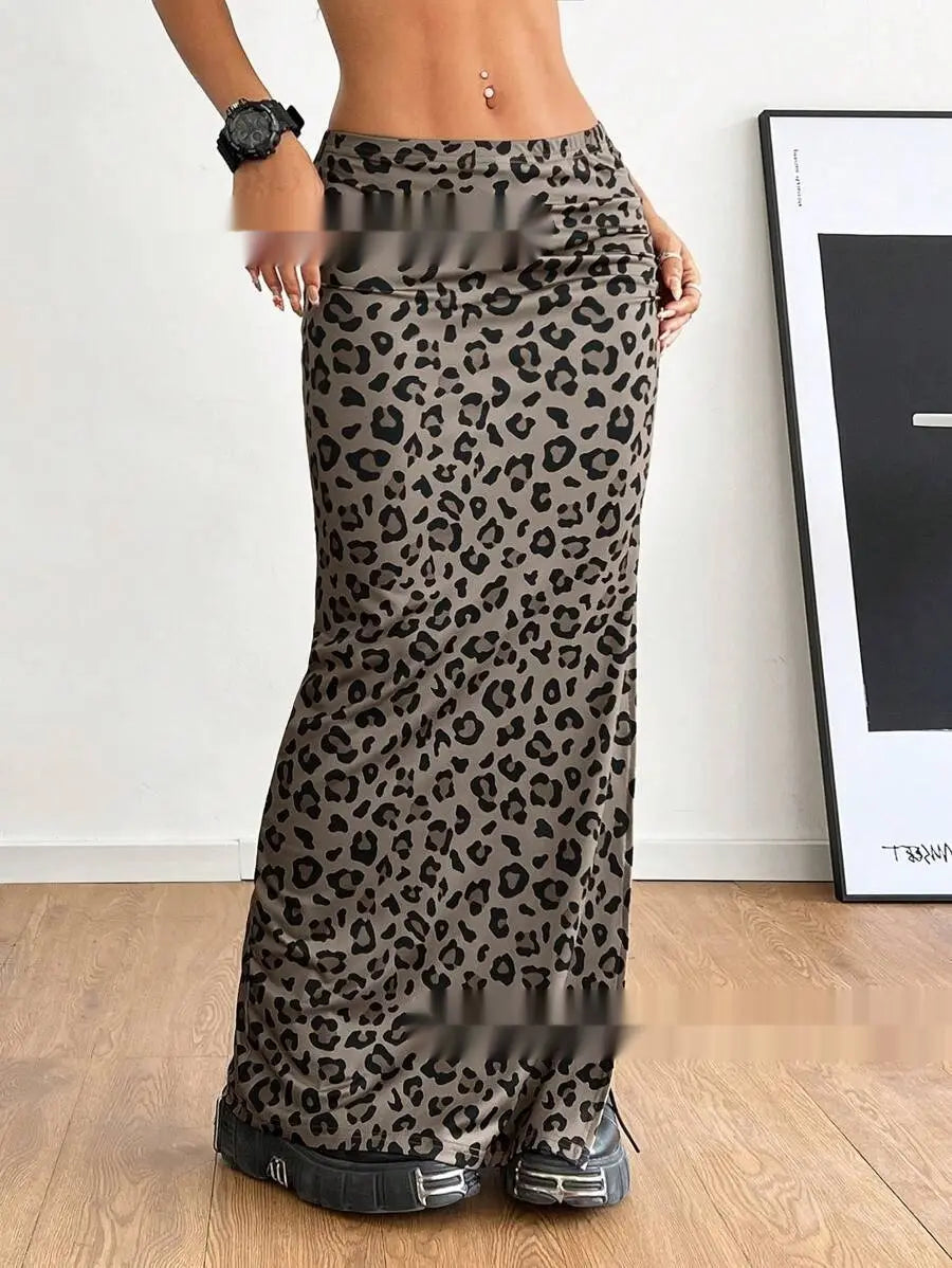 A flowing gray leopard print high waisted maxi skirt with an elasticated waistband and side slit.