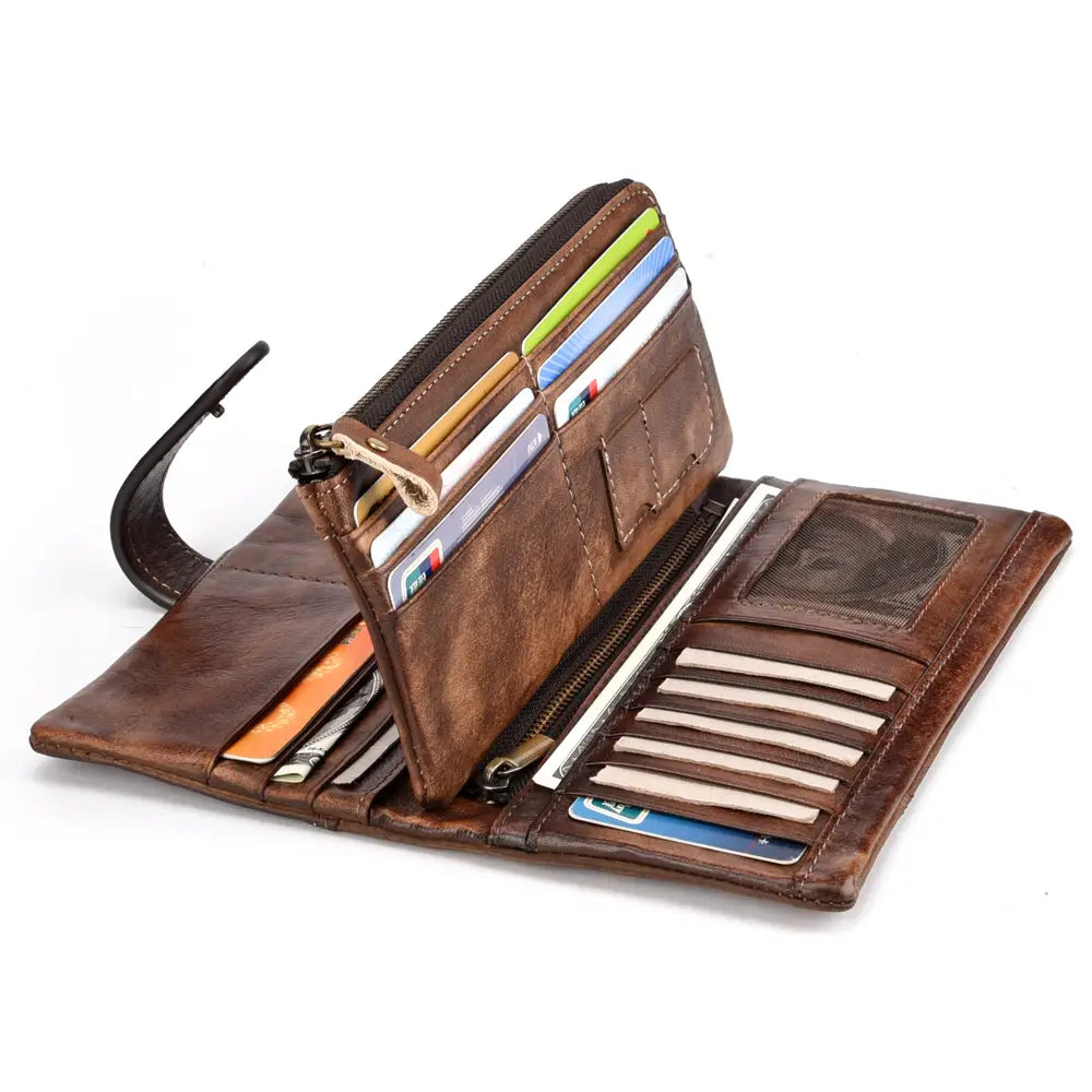Brown leather long wallet with vintage stitching featuring multiple card slots, zipper compartments, and a detachable strap.