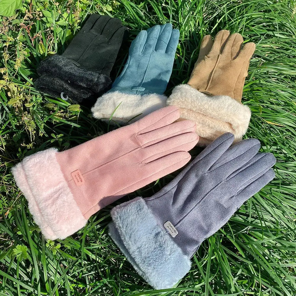 A collection of women’s thermal suede touchscreen gloves in soft pastel and neutral tones with plush faux fur cuffs.