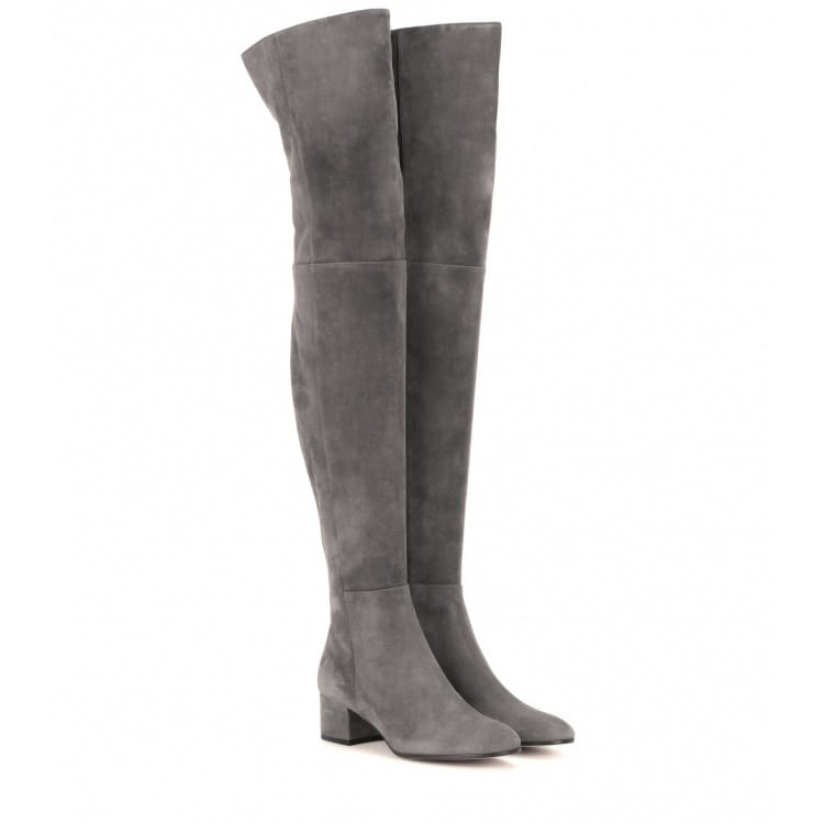 A pair of sleek dark gray suede over the knee boots with a low block heel.