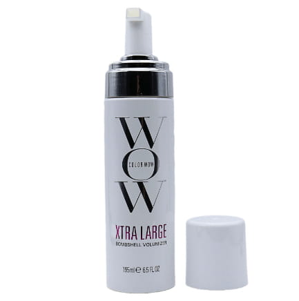 White cylindrical bottle of Color Wow Xtra Large Bombshell Volumizer hair mousse with silver pump and black accent ring for extra large volumizing foam.