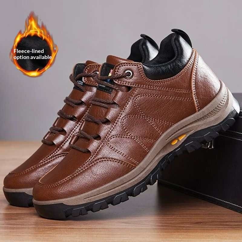 men’s leather winter hiking boots waterproof shoes in brown leather with black accents and a rugged rubber sole designed for outdoor use