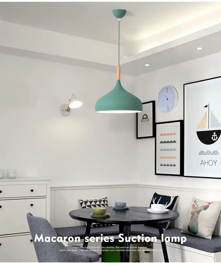 Teal-colored nordic macaron LED pendant light with wood accent and sleek modern design.