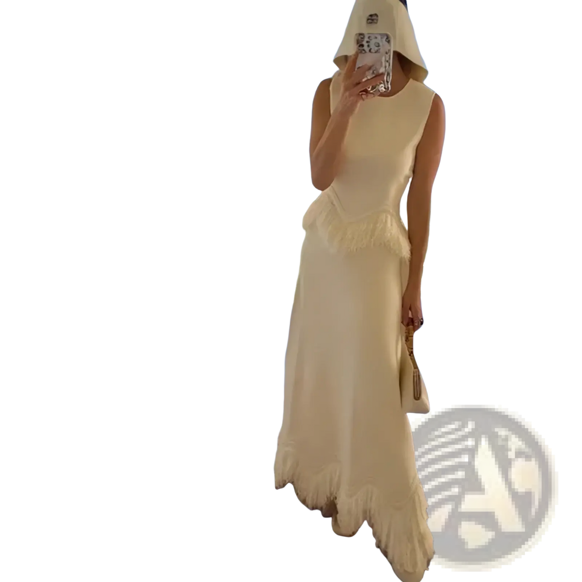 Cream-colored sleeveless maxi dress with fitted bodice, ruffled waistline, and flowing fringe hem from feather trim set